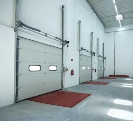 650N/M2 Πίεση ανέμου Βιομηχανικές διατομικές πόρτες Διατομικές υπερυψωμένες πόρτες γκαράζ ευρωπαϊκή πρότυπη ποιότητα σύγχρονη πόρτα