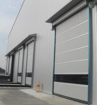 Βιομηχανικές γρήγορες πόρτες κυλίνδρων 1.2mm θερμοκρασία χρήσης παραθυρόφυλλων αυτοματοποίησης ανοξείδωτου PVC 	-30°C- +70°C
